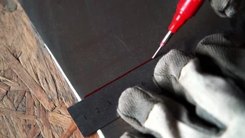 Marking straight red line with marker Stock Footage 161165184