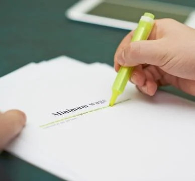 Marking words in a minimum wage definition Stock Photos