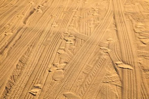 Marks of tires in the sand Stock Photos