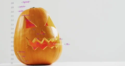 On markup appearing behind pumpkin code overlay scrolling revealing Stock Footage 317792307