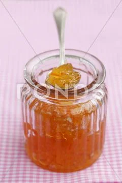 Marmalade In A Jar And On A Spoon