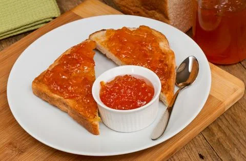 Marmalade on toast Stock Photos