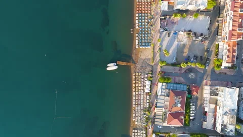 Marmaris, Turkey. Top down view showing geometric pattern of beach umbrellas and Stock Footage 320038127