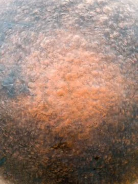 Maro texture of old rusty and scratched brass or bronze metal plate Foto stock