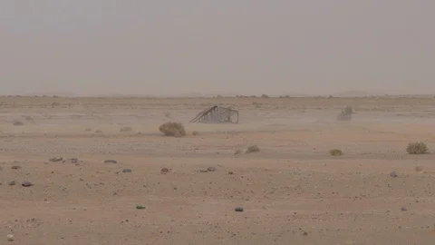 Maroccan arid landscape, wind raises the sand, Africa in 4K Stock Footage 92055506
