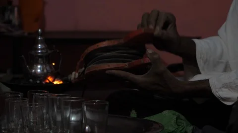 A Maroccan man prepares tea in his house, africa in 4K Stock Footage 92106156