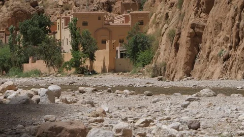 Maroccan valley; river, mountain and trees, houses in background Africa in 4K Stock Footage 92055559