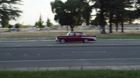 Maroon 1957 Chevy Coupe Stock Footage 279863758