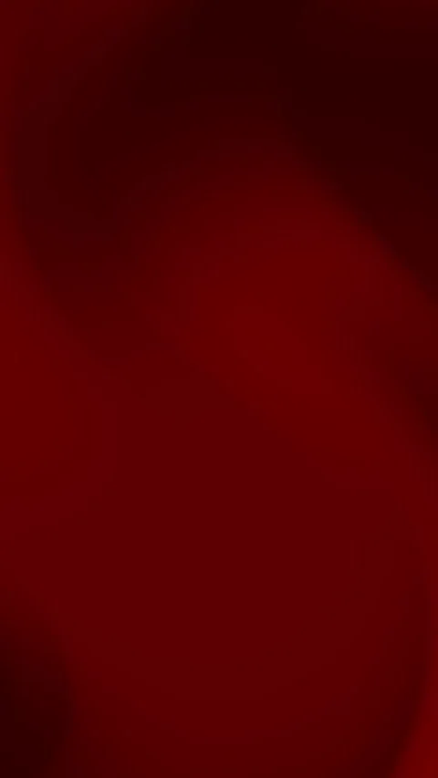 Maroon abstract background with smooth fluid transitions, 4K vertical video. Stock Footage 280156623