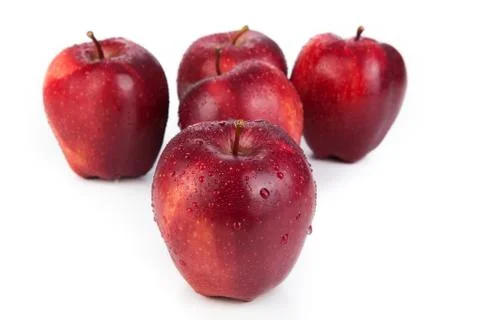 Maroon apples closeup on a white background Stock Photos