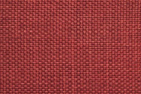 Maroon background with braided checkered pattern. Texture of weaving fabric Stock Photos