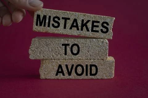 On maroon background, there are three brick blocks with the text Stock Photos