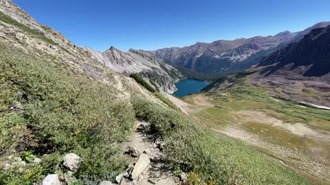 Maroon Bells 4 Pass Loop Trail run: Snowmass Lake Stock Footage 329455095