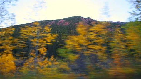 Maroon Bells driving side car pov in open Colorado fall mountains Stock Footage 140396177