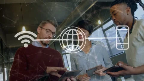 Maroon-clad lead tapping tablet and guiding tech review, team mirroring, overlay Stock Footage 333211174