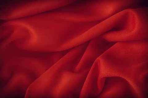 A maroon fabric texture background. Close up. Stock Photos