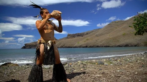 Marquesas male blowing conch shell Nuku Hiva Marquesas Stock Footage 90644618