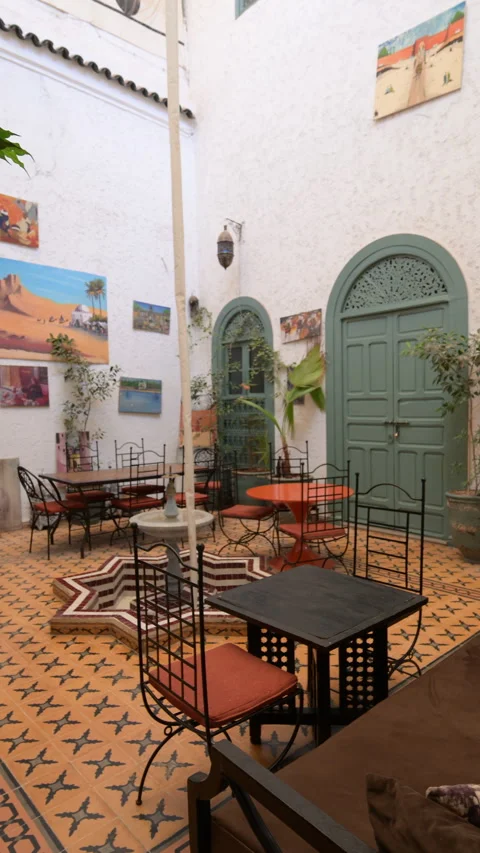Marrakech, morocco. August 8, 2026. Elegant interior courtyard of a traditional Stock Footage 343715386