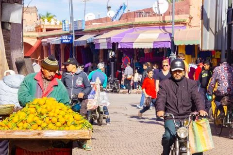 MARRAKECH, NOVEMBER 10 2018: Crowd of people at an old market in medina district Stock Photos