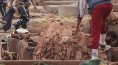 MARRAKECH TANNERY - MEN AT WORK # 3 Stock Footage 27995723