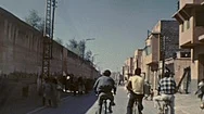 Marrakesh, Morocco - 1973: Boys With Their Bicycles In The Street Stock Footage