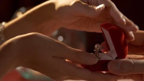 Marriage Proposal - A man gives ring to woman 4k Stock Footage 76651869