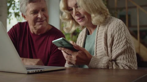 A married couple are looking for something on the Internet Stock Footage 170271415