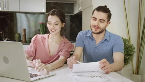 A married couple are working together at home Stock Footage 156478995