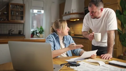 Married couple arguing about paying bills Stock-Footage 299613872
