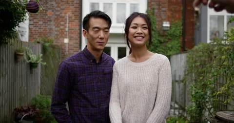 Married couple get a key to their new home. Shot on RED Epic. Stock Footage 58767907
