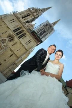Married couple posing in city Stock Photos