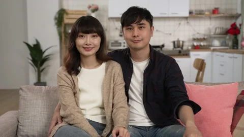 Married couple smiling and looking at the camera Stock Footage 168752705