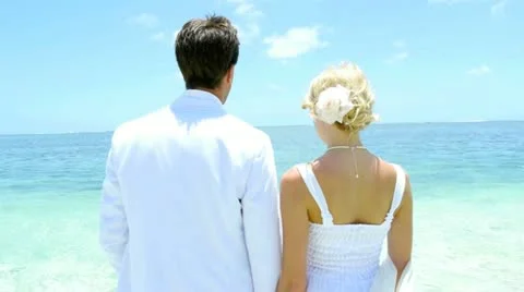 Married couple standing by the sea Stock-Footage 14828034