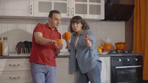 The married couple is talking about how to organize their house. Stock Footage 148252833