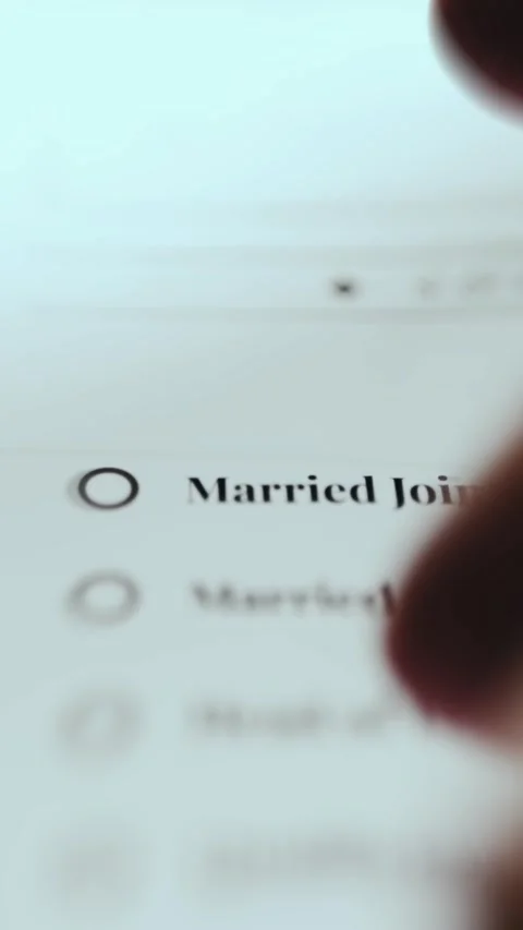 Married Filing Jointly Selection on Tax Form Stock Footage 337888361