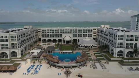 The Marriott Cancun Resort, with sand grading tractors, Cancun, Mexico Video stock 154825275