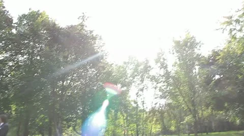 Marrying couple on a swing. Photographing process in park Stock Footage 20467193