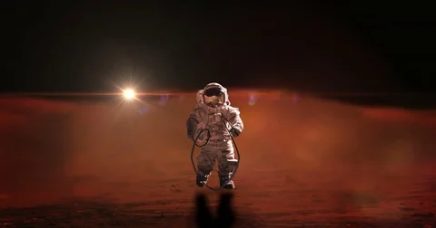 Mars Astronauts Jump Roping on Mars Surface Red Fare Blur Background Stock Footage 76901059