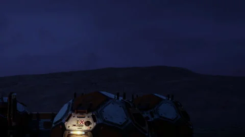 Mars habitat under night sky with mountains in background Stock Footage 343545032