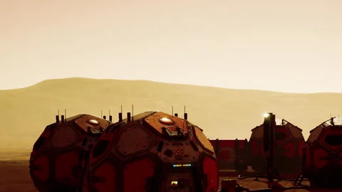 Mars habitat under a setting sun with mountains in background Stock Footage 344096595