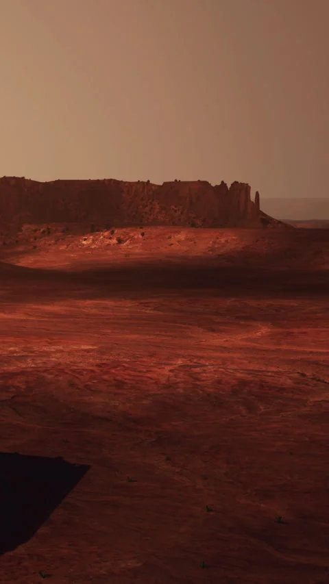 Mars landscape shows red soil and distant rocks under orange sky Stock Footage 337951912