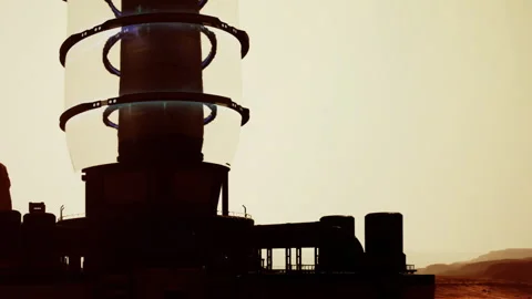 Mars landscape with a tall structure during sunset Stock Footage 343513215