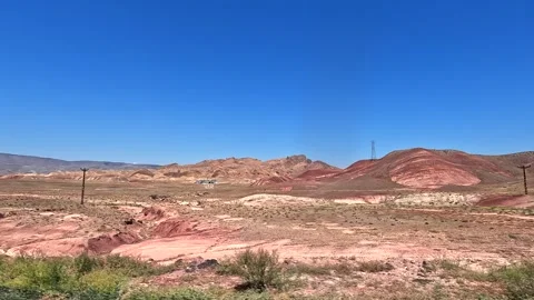 Mars-like red hills fill a wide roadside view in Turkey Stock Footage 343805299