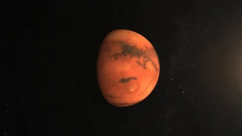 Mars rotates slowly. The camera is approaching the planet. A large surface of Stock Footage 99251182