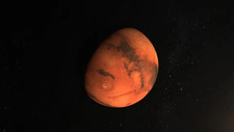 Mars rotates slowly. The camera is approaching the planet. A large surface of Stock Footage 99596591