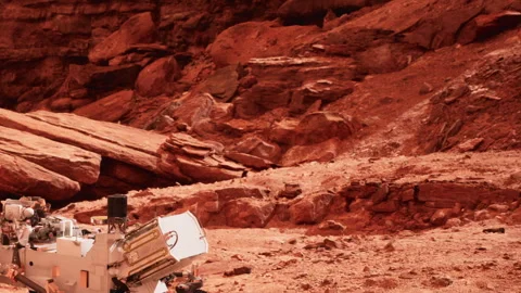 Mars rover explores rocky terrain on red planet during scientific mission Stock Footage 345047292