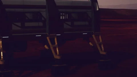 Mars rover exploring the surface of the red planet during sunset Stock Footage 343576995