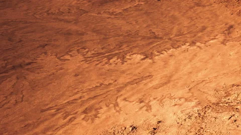 Mars surface shows patterns and textures across the sandy terrain in daylight Stock Footage 340628138