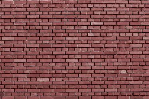 Marsala brick wall background Stock Photos