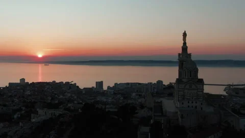 MARSEILLE-LOCKDOWN Notre-dame-sunset-descent LUT 스톡 동영상 131332100